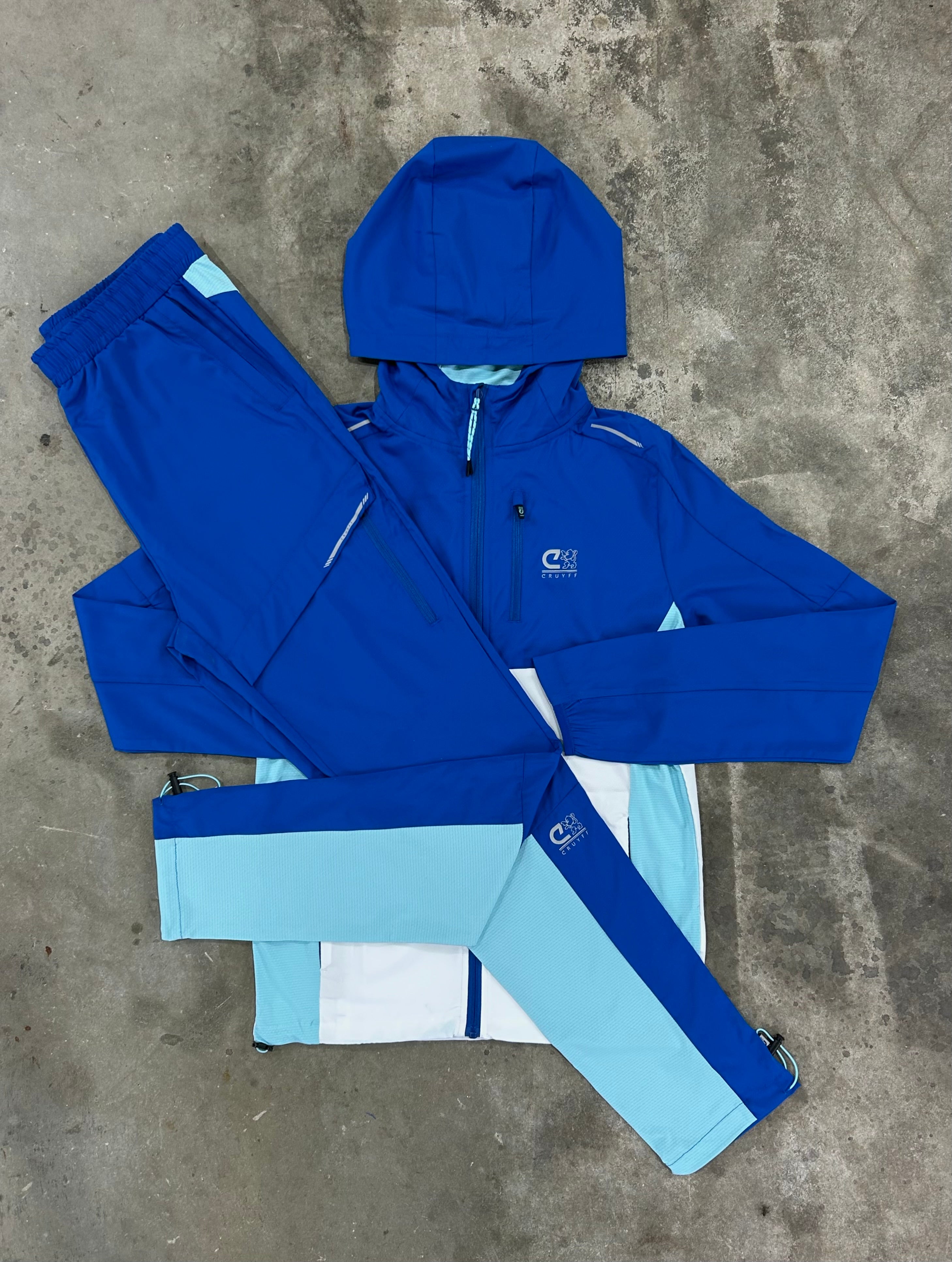 Cruyff Junior Igneous Blue Tracksuit - Windbreak / Pant